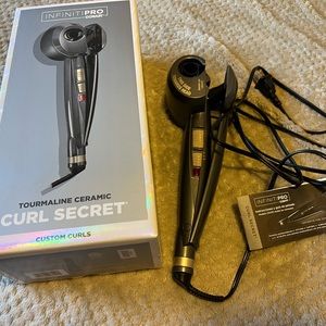 Conair infinity curl secret.   Brand new.  Never used